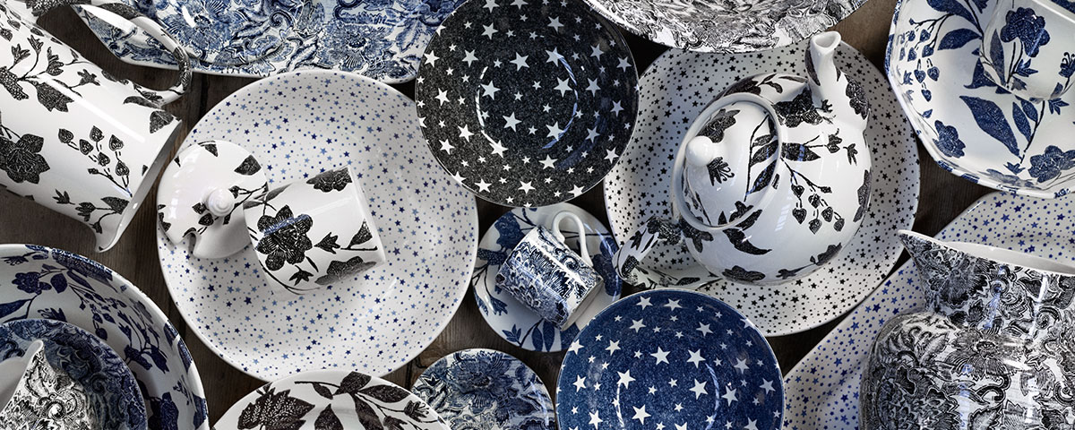 Plates with floral and star patterns in navy & black