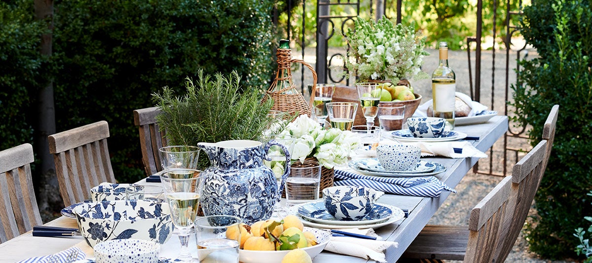 Outdoor table set with blue-and-white floral dishes and home-dining-serveware