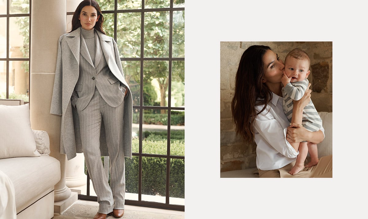 Woman wears light grey pinstripe suit under long grey coat.